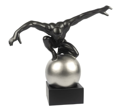 Statuette of a Man on a Ball